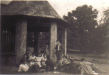 Boys and girls having picnic lunch during open day at Summer House 1950
